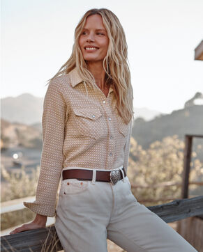 Woman standing outside wearing a Pendleton Shirt