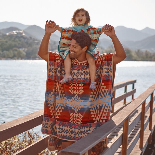 Dad and Child on a Lake Dock