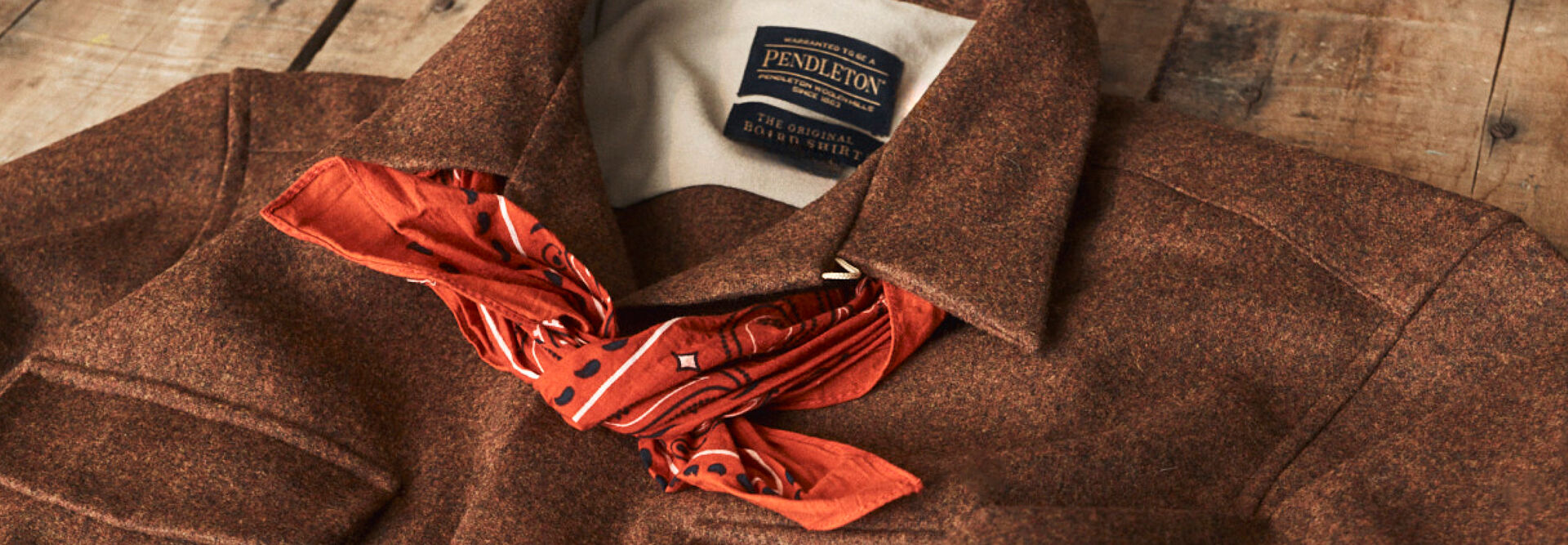 Brown wool jacket and red bandana