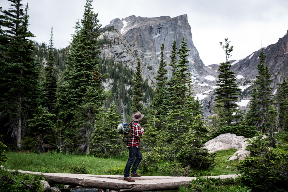 A man, a backpack, and the stunning splendor of the Rocky Mountains. photo by kate Rolston.