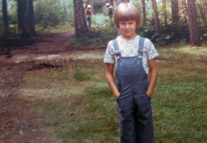 A young Susan Karlstrom in her overalls.