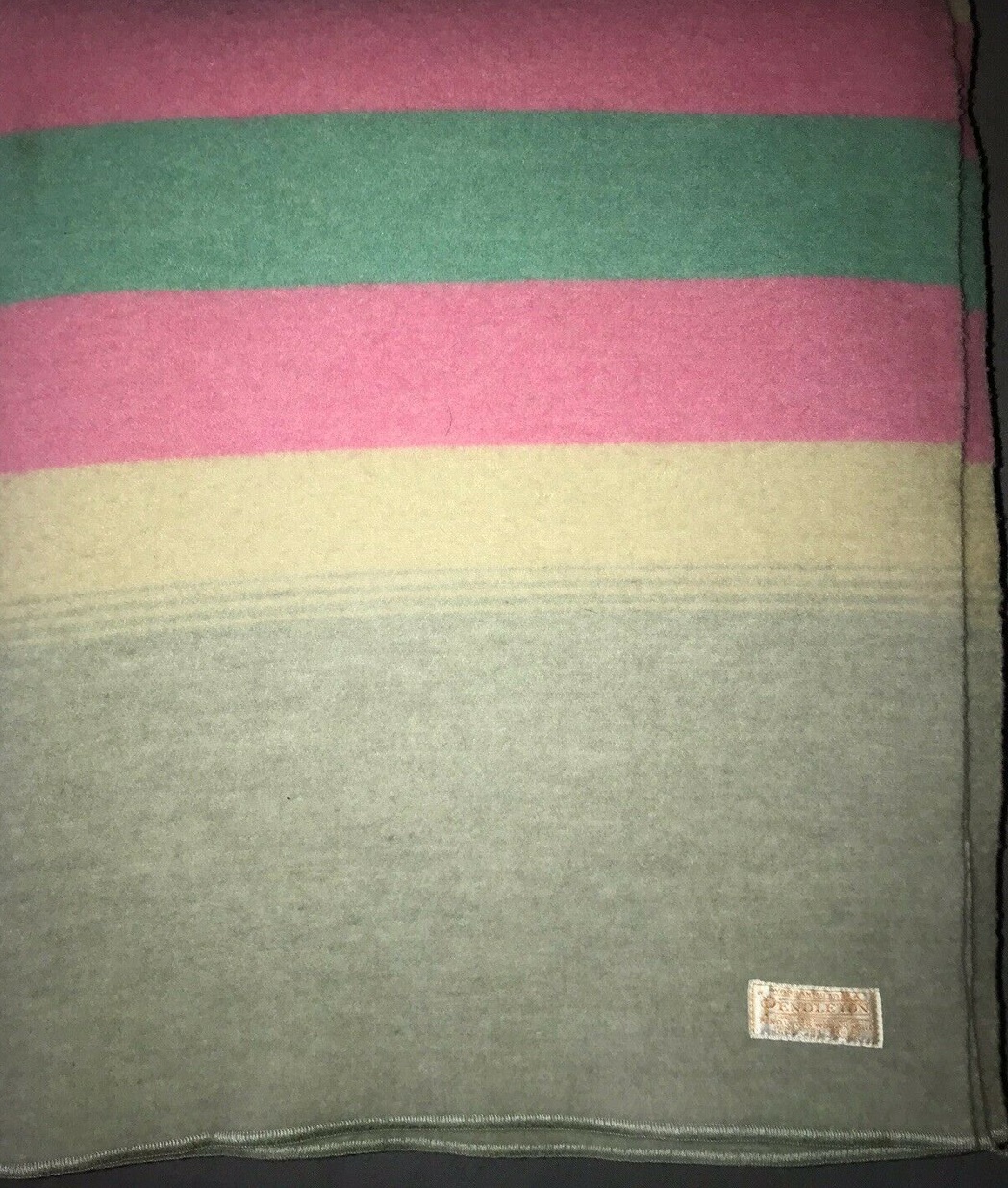 A folded shot of the 1960s version, with stitched binding.