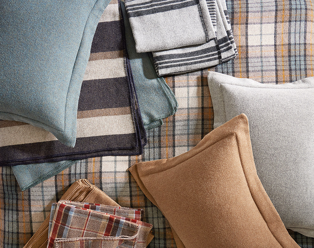 Pendleton Eco-Wise Wool shams, arranged with Eco-Wise Wool blankets.