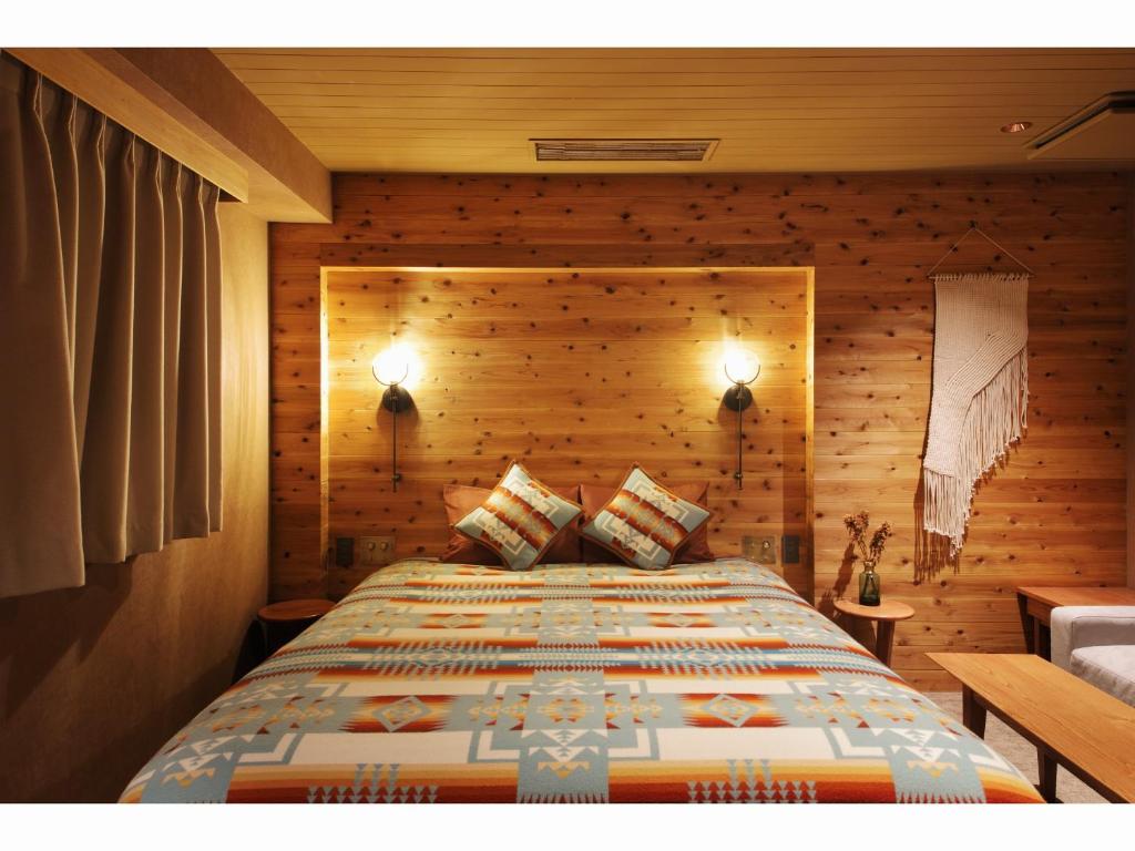 Another lodge-themed room at Hotel Unwind in Sapporo, Japan, featuring a Pendleton Chief Joseph blanket.
