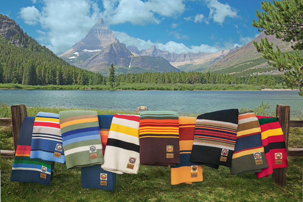 Pendleton National Park blankets on a wooden fence in front of glaciers