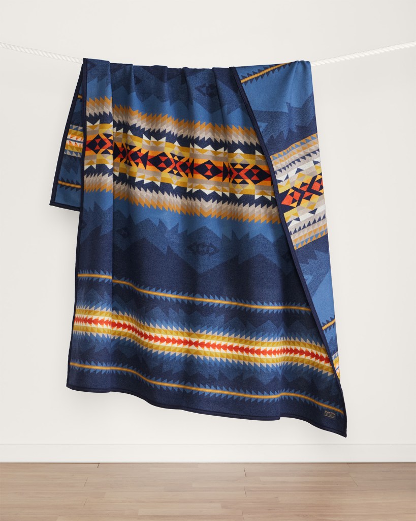 Pendleton Cascadia blanket hanging over a rope.